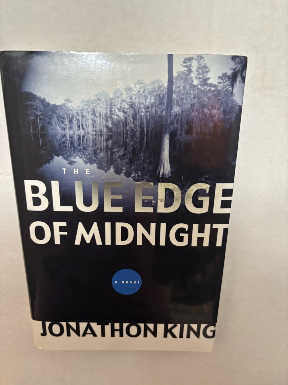 The Blue Edge of Midnight — Blue Hardcover Novel